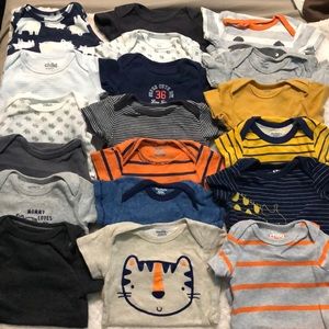 A variety of newborn onesies